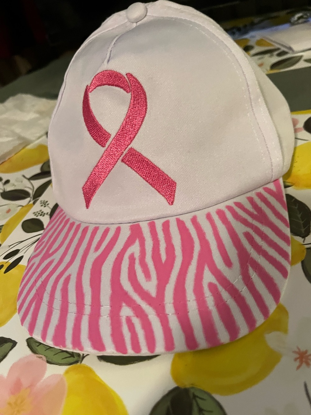 We Womenβs Pink Ribbon Baseball Cap - Pink Zebra Visor